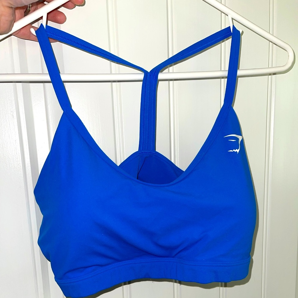 Bought then got a boob job. Never worn!